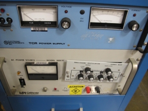 POWER SUPPLY CABINET, WITH ELECTRONIC MEASUREMENTS INC. TCR POWER SUPPLY, CALIFORNIA INSTRUMENTS INVERTRON MODEL 1001TC. LOADING & HANDLING FEE $15-4528